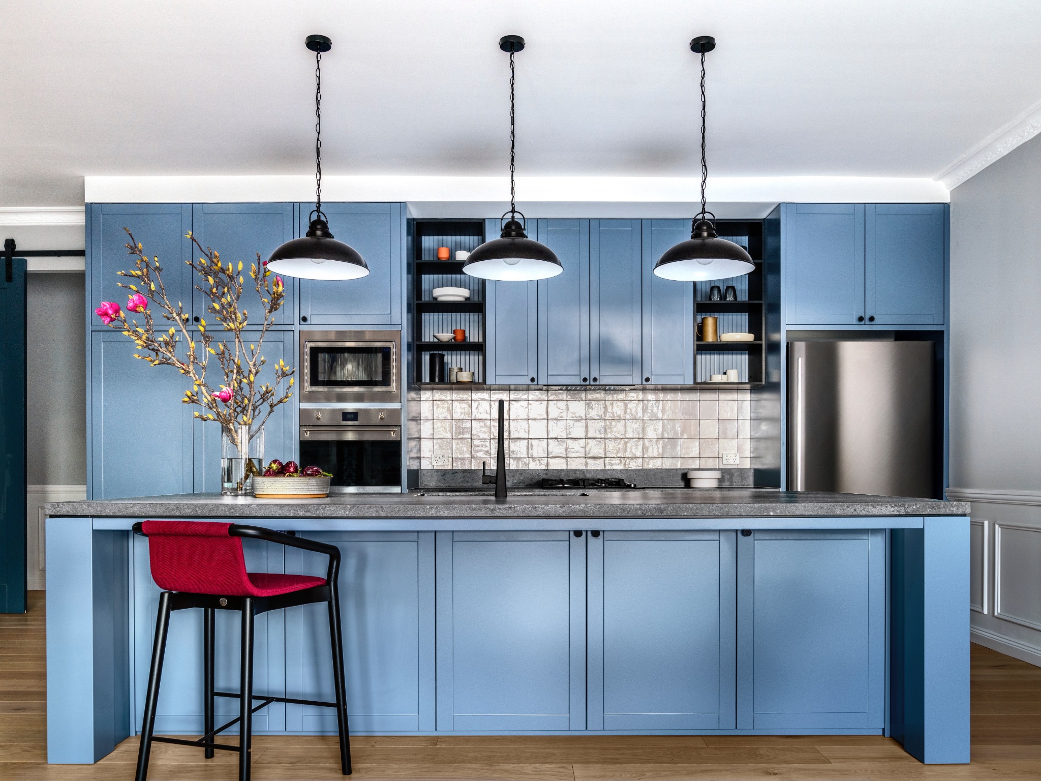 The Warawee Kitchen with blue cabinetry and marble surfaces