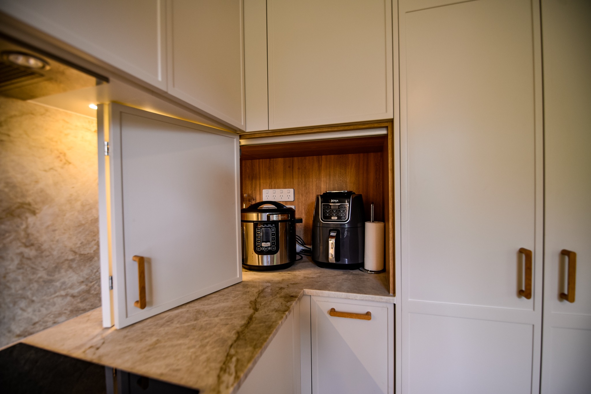 Hidden Appliance Station bespoke kitchen